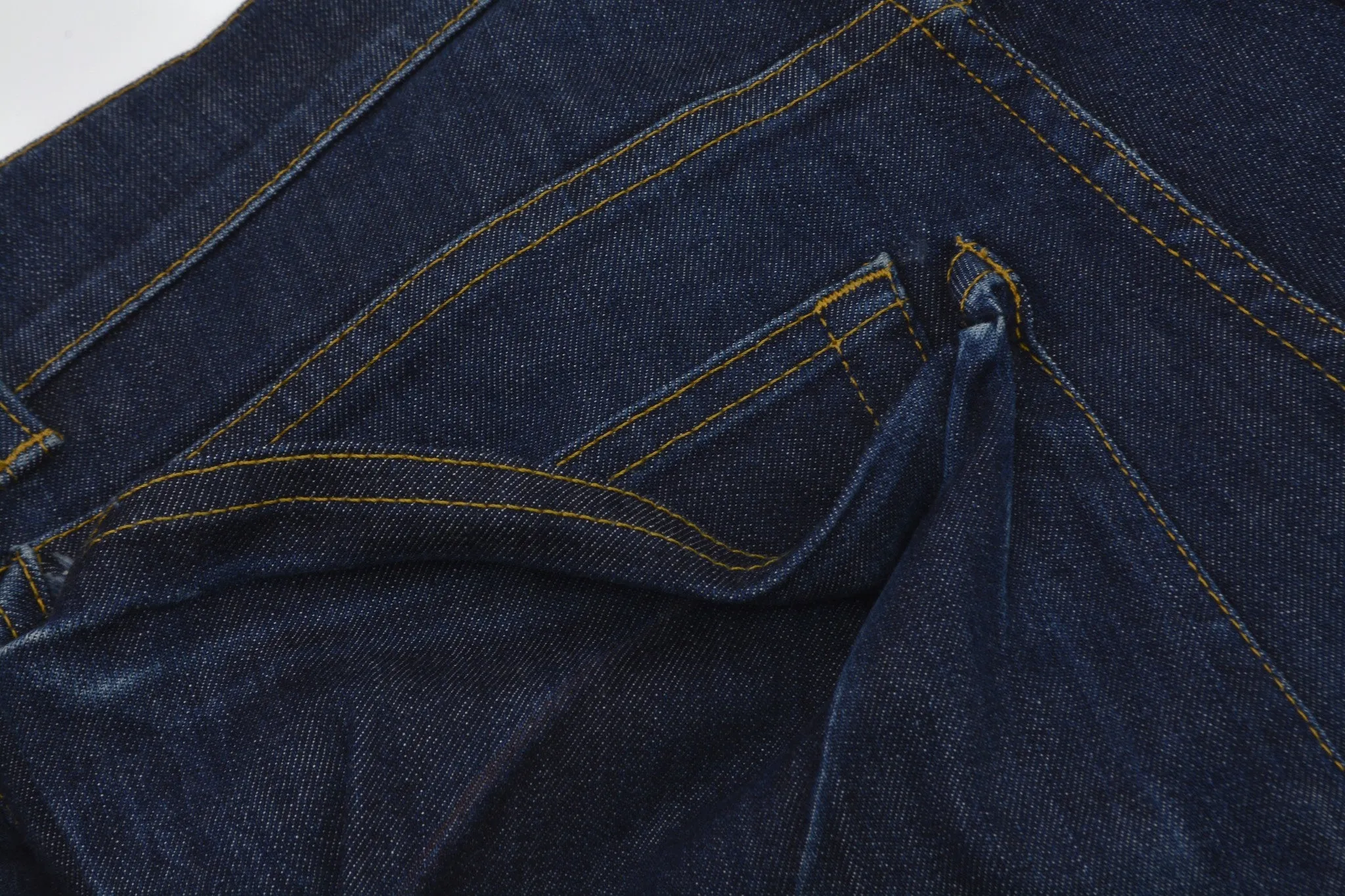 2004 Elastic Raw Denim Slim Jeans with Asymmetric Waist Pockets